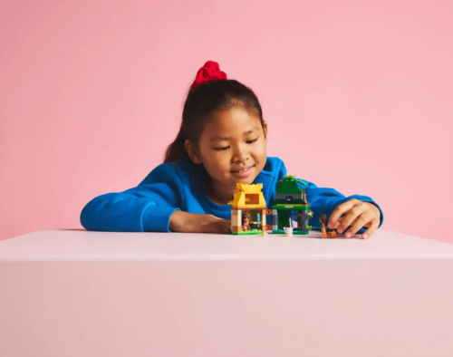 girl playing with legos